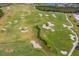 Expansive golf course featuring sand traps, manicured greens, and vibrant landscaping at 16531 Kendleshire Ter, Lakewood Ranch, FL 34202