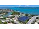 Captivating aerial shot of neighborhood, offering stunning coastal scenery and easy access to waterfront at 1740 Alderman St # 7, Sarasota, FL 34236