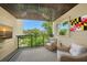 Relaxing balcony featuring comfortable seating with an outdoor view and decor at 1740 Alderman St # 7, Sarasota, FL 34236