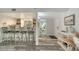 Stylish condo bar area featuring seating and ample storage for spirits and glassware with direct access to other rooms at 1740 Alderman St # 7, Sarasota, FL 34236