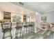 Wet bar area with modern finishes, wine storage and seating area at 1740 Alderman St # 7, Sarasota, FL 34236