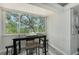 Bright breakfast nook with large windows overlooking the outdoor area at 1740 Alderman St # 7, Sarasota, FL 34236