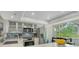 This bright kitchen features stainless steel appliances, under cabinet lighting and serene outdoor views at 1740 Alderman St # 7, Sarasota, FL 34236
