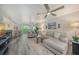 Stylish open-concept living room with modern finishes and abundant natural light at 1740 Alderman St # 7, Sarasota, FL 34236