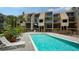 Lovely community pool near waterfront condos, set amongst lush greenery and palm trees at 1740 Alderman St # 7, Sarasota, FL 34236