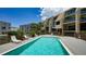 Beautiful swimming pool surrounded by modern condos, ideal for outdoor living at 1740 Alderman St # 7, Sarasota, FL 34236