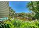 Beautiful waterfront view with lush greenery and private docks, perfect for relaxation at 1740 Alderman St # 7, Sarasota, FL 34236