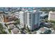Stunning aerial view of the modern high-rise building in a vibrant urban setting, showcasing its architectural design at 1771 Ringling Blvd # 1206, Sarasota, FL 34236