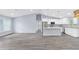 Open concept with tile flooring, recessed lighting, and stainless steel appliances in the kitchen at 19185 Sherbrooke Ave, Port Charlotte, FL 33954