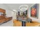 Modern dining area featuring unique lighting and seamless access to a stylish kitchen at 1921 Monte Carlo Dr # 302, Sarasota, FL 34231