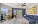 Bright living room with a balcony, chic furniture, and large windows offering scenic views at 1921 Monte Carlo Dr # 302, Sarasota, FL 34231