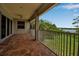 Covered patio with tile floors and outdoor view at 2048 Larson St, Englewood, FL 34223