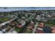 Aerial view showcasing the location of the home on the water in a scenic community at 205 Sugarloaf Dr, Nokomis, FL 34275