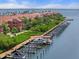 Aerial shot capturing a waterfront community with boat docks and waterfront buildings at 2741 Via Cipriani # 935A, Clearwater, FL 33764