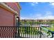 Balcony view of the waterfront condos, lush landscaping, and private boat docks at 2741 Via Cipriani # 935A, Clearwater, FL 33764