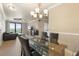 Open-concept dining area with ample seating, seamlessly connected to the living spaces for gatherings at 2741 Via Cipriani # 935A, Clearwater, FL 33764