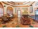 Comfortable game room featuring a pool table, seating area, and warm design elements at 2741 Via Cipriani # 935A, Clearwater, FL 33764