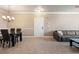 Bright living area with tile flooring, modern lighting, and comfortable seating arrangement at 2741 Via Cipriani # 935A, Clearwater, FL 33764