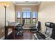 Home office overlooking the water featuring wood floors and a desk at 2741 Via Cipriani # 935A, Clearwater, FL 33764