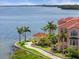 Waterfront community with mature palms, a gazebo and panoramic views at 2741 Via Cipriani # 935A, Clearwater, FL 33764