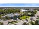 Aerial view of the community featuring a pool, lake, and clubhouse at 3344 Anchor Bay Trl, Bradenton, FL 34211
