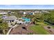 Aerial view of community pool, playground, and beautiful homes in the neighborhood at 3344 Anchor Bay Trl, Bradenton, FL 34211