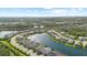 Scenic aerial view of a waterfront community with lush greenery and beautiful lakes at 3344 Anchor Bay Trl, Bradenton, FL 34211
