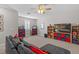 Bright bonus room with neutral walls and carpet, ceiling fan, storage and ample space for flexible living at 3344 Anchor Bay Trl, Bradenton, FL 34211