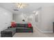 Bright bonus room with neutral walls and carpet, ceiling fan and ample space for flexible living at 3344 Anchor Bay Trl, Bradenton, FL 34211