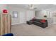 Bright bonus room with neutral walls and carpet, ceiling fan and ample space for flexible living at 3344 Anchor Bay Trl, Bradenton, FL 34211