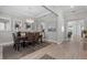 Formal dining room featuring modern chandelier, neutral walls, and seating for six at 3344 Anchor Bay Trl, Bradenton, FL 34211