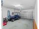 Spacious three car garage with ample storage space and a clean, organized layout, ideal for car enthusiasts at 3344 Anchor Bay Trl, Bradenton, FL 34211