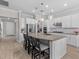 Bright kitchen with a large granite island, stainless appliances, and plenty of counter space at 3344 Anchor Bay Trl, Bradenton, FL 34211