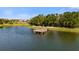 A lovely lake view with a small wooden bridge in the park at 3344 Anchor Bay Trl, Bradenton, FL 34211