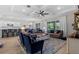 Open concept living space with kitchen, dining area and living room connected. Ideal for entertaining and easy living at 3344 Anchor Bay Trl, Bradenton, FL 34211