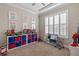 Bright playroom with organized shelves and colorful decor, perfect for  at 3344 Anchor Bay Trl, Bradenton, FL 34211