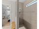 Modern shower with neutral tilework, bench seating, and convenient built-in niche at 3344 Anchor Bay Trl, Bradenton, FL 34211