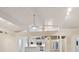 Bright kitchen featuring white cabinets, stainless steel appliances, and an open layout, perfect for modern living at 355 Shore Dr, Ellenton, FL 34222