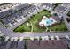 Aerial view of the community shows the community pool, common areas, and well-maintained landscaping at 3681 Divot Ln, Sarasota, FL 34232