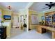 Stylish office area with a large desk, a wooden bookcase, and tasteful decor at 3681 Divot Ln, Sarasota, FL 34232