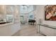 Bright living room with high ceilings, grand piano and open floor plan at 413 Partridge Cir, Sarasota, FL 34236