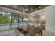 Covered outdoor kitchen with stainless steel grill and ample counter space, ideal for entertaining at 413 Partridge Cir, Sarasota, FL 34236