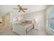 Bright bedroom with a double bed, lots of sunlight, and closet access at 4211 Caddie E Dr # 202, Bradenton, FL 34203
