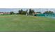 Expansive green golf course offers a picturesque view with well-maintained greens and clear skies at 4211 Caddie E Dr # 202, Bradenton, FL 34203