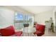 Relaxing screened lanai with comfortable seating and serene lake views at 4211 Caddie E Dr # 202, Bradenton, FL 34203