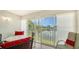 Enclosed lanai offering serene water views, perfect for relaxation at 4211 Caddie E Dr # 202, Bradenton, FL 34203