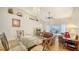 Bright living room area with vaulted ceilings and dining space at 4211 Caddie E Dr # 202, Bradenton, FL 34203