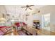Inviting living room with vaulted ceilings, opening to lanai at 4211 Caddie E Dr # 202, Bradenton, FL 34203