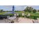 Outdoor patio seating with lake view at 4211 Caddie E Dr # 202, Bradenton, FL 34203