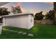 The exterior of the building with a window and green grass at 4232 Pandora Rd, Venice, FL 34293